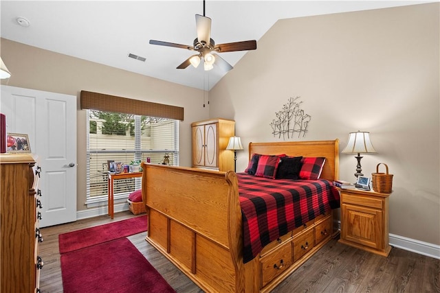 bedroom featuring dark wood-type flooring, ceiling fan, and lofted ceiling