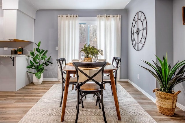 dining room featuring light wood-type flooring