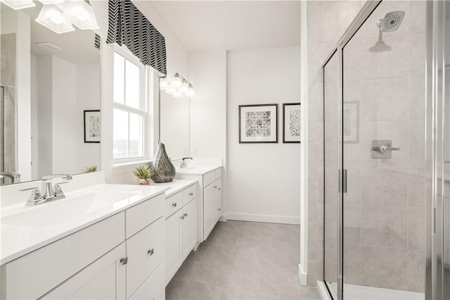 bathroom with vanity and walk in shower