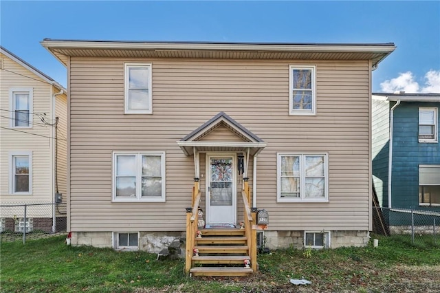 view of front of house with a front lawn