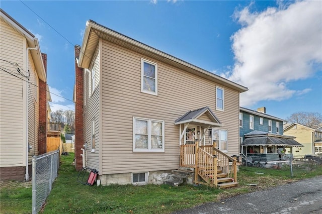 view of front of home with a front yard