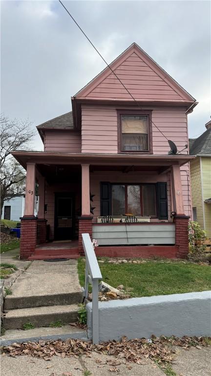 view of front facade featuring covered porch