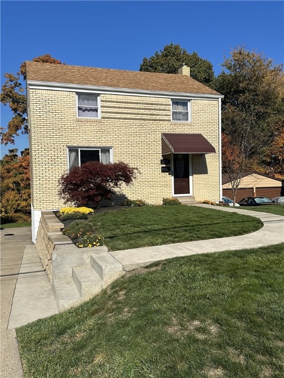 front of property with a front yard