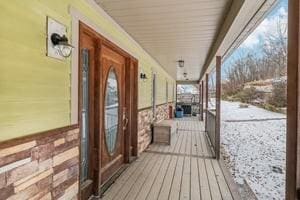 wooden terrace with covered porch