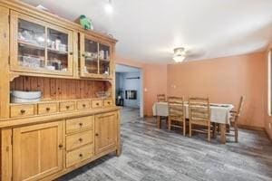 kitchen with light brown cabinetry, dark hardwood / wood-style flooring, and ceiling fan