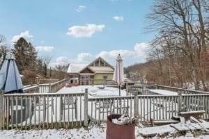 view of snow covered deck