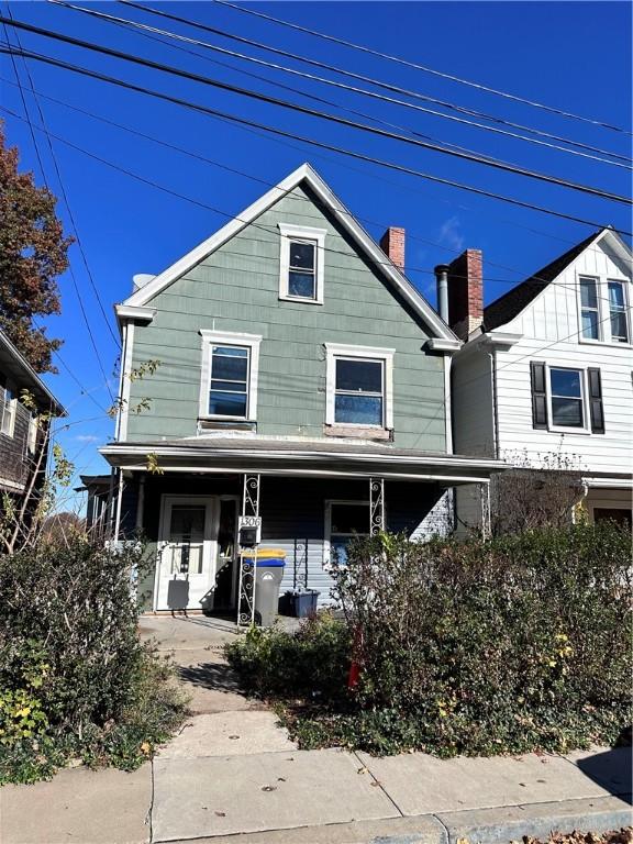 view of front of property featuring covered porch