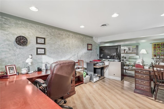 office space featuring light hardwood / wood-style floors