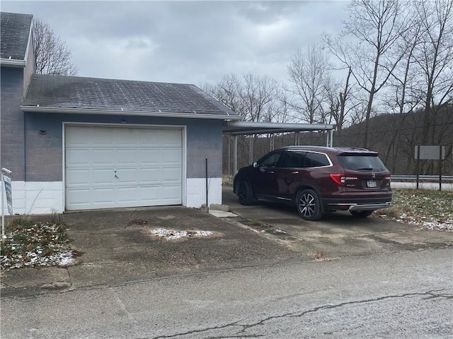 garage with a carport