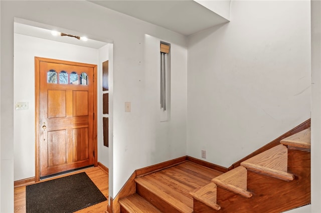 entryway with light hardwood / wood-style flooring