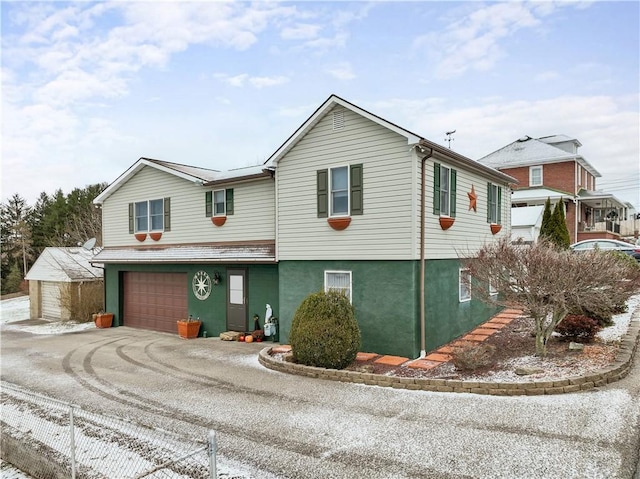 view of front of house with a garage