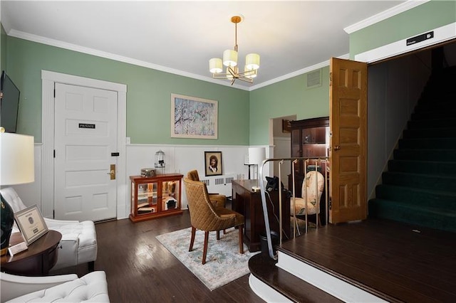 interior space featuring a notable chandelier, crown molding, dark wood-type flooring, and radiator