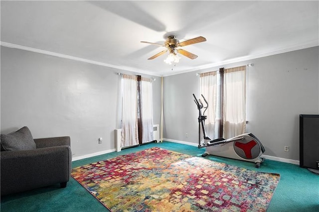 exercise area featuring carpet flooring, plenty of natural light, and crown molding