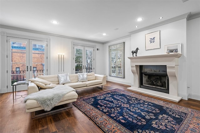 living room with hardwood / wood-style floors and french doors