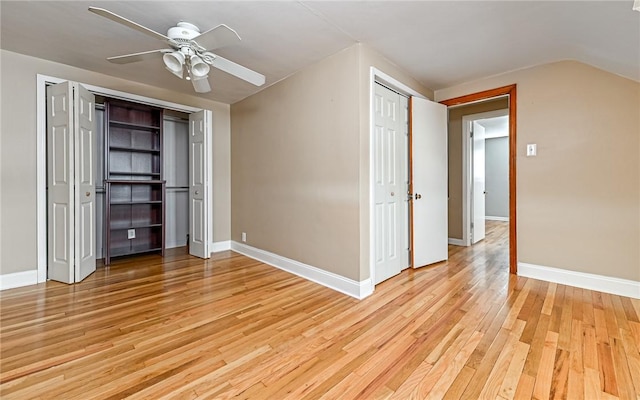 unfurnished bedroom featuring ceiling fan and light wood-type flooring