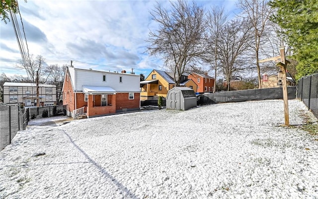 view of snow covered property