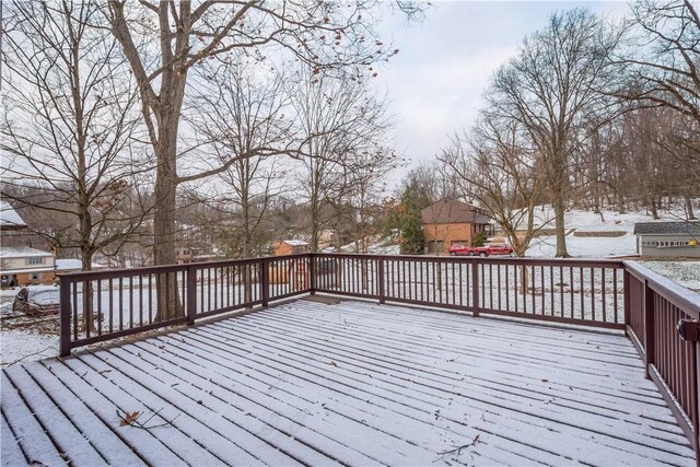 view of snow covered deck