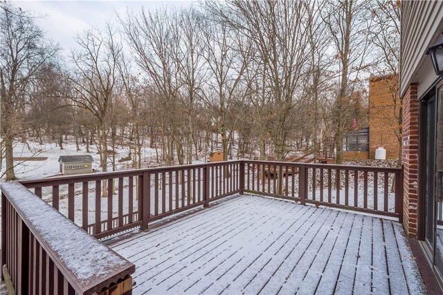 view of snow covered deck