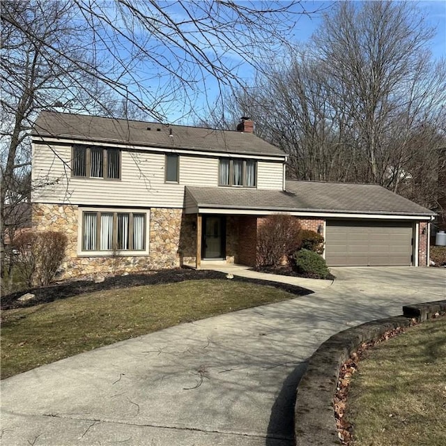 traditional-style home featuring a garage, stone siding, driveway, a chimney, and a front yard