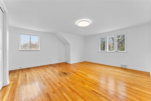 bonus room featuring light hardwood / wood-style floors