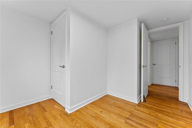 corridor featuring light hardwood / wood-style floors