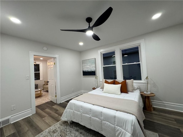 bedroom featuring ceiling fan and dark wood-type flooring