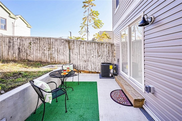 view of patio / terrace with central air condition unit