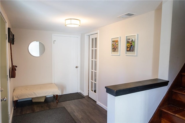 hallway featuring dark hardwood / wood-style floors