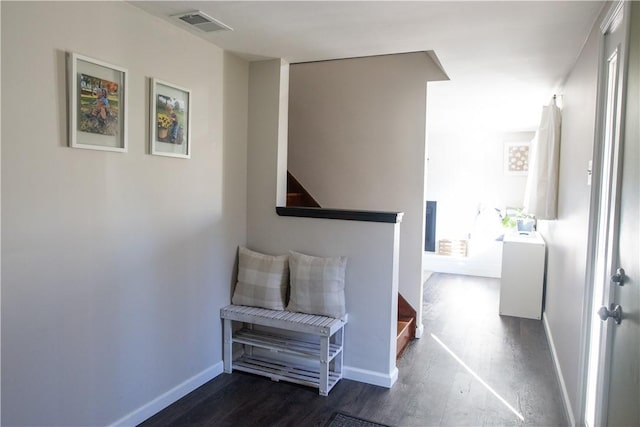 hallway featuring dark hardwood / wood-style floors