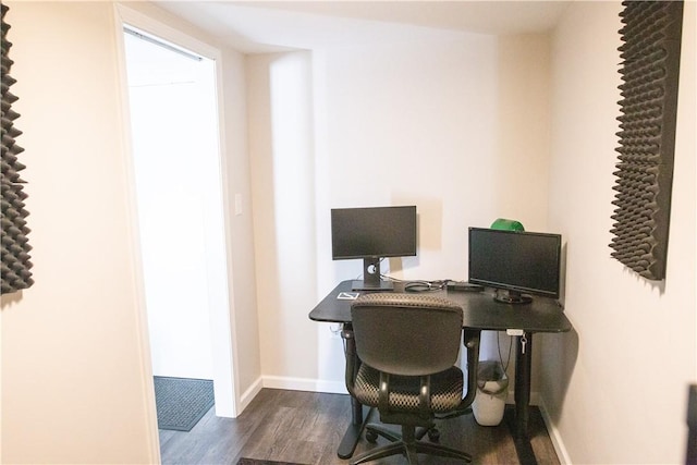 office space featuring dark wood-type flooring