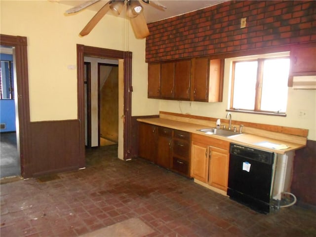 kitchen featuring ceiling fan, dishwasher, sink, brick wall, and a wall mounted AC