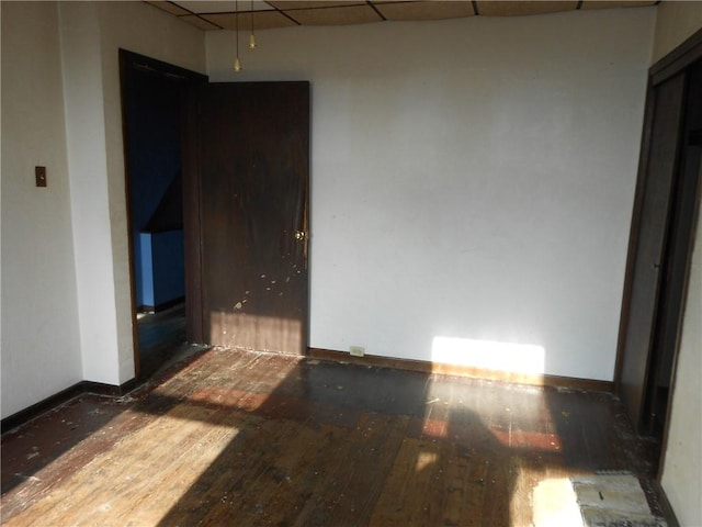 empty room featuring dark wood-type flooring