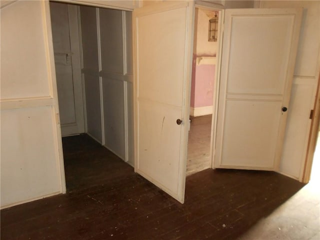 hallway featuring dark hardwood / wood-style floors