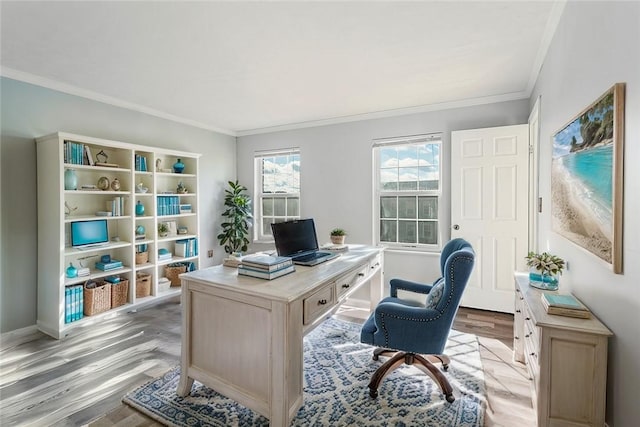 office space with light wood-type flooring and ornamental molding