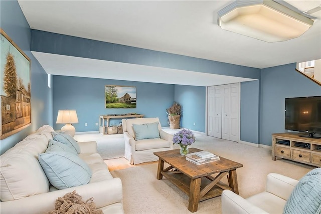 living room featuring light colored carpet