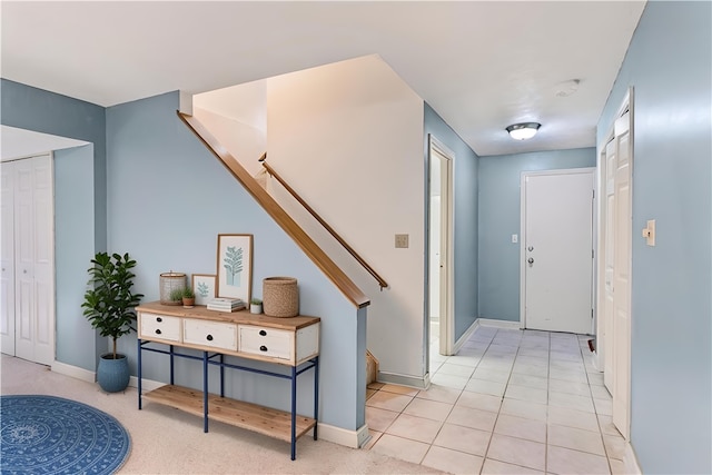 hallway featuring light tile patterned flooring