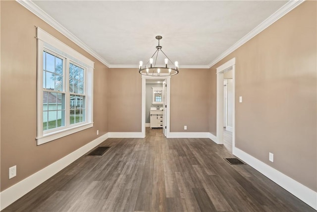 unfurnished dining area with a chandelier, crown molding, and dark wood-type flooring