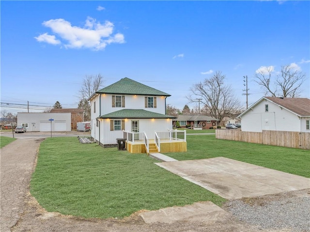 view of front of home with a front lawn