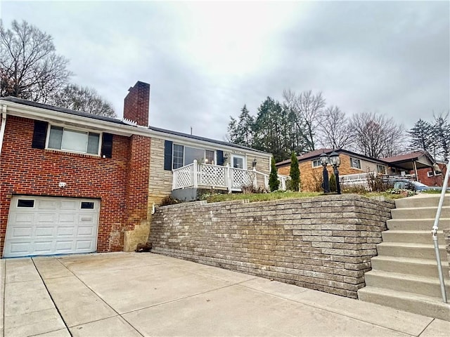 view of front of home with a garage