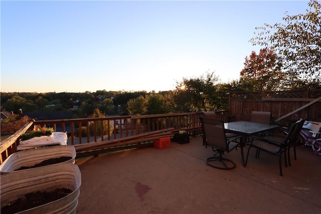 view of patio terrace at dusk