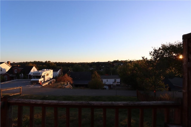 view of yard at dusk