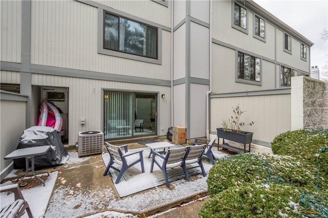 back of house with a patio and central AC unit