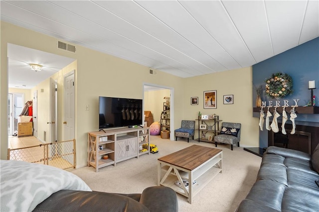 living room featuring light carpet