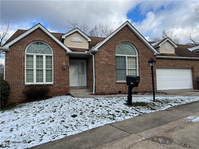 front of property with a garage