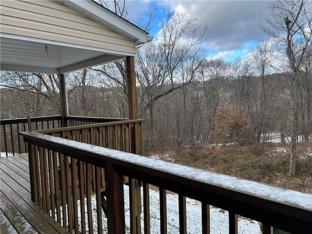 view of snow covered deck