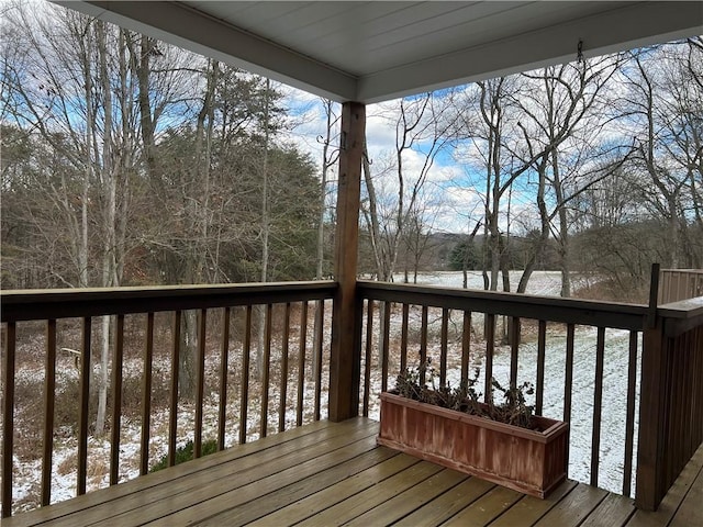 view of snow covered deck