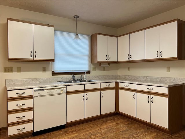 kitchen featuring dishwasher, decorative light fixtures, white cabinets, and dark wood-type flooring