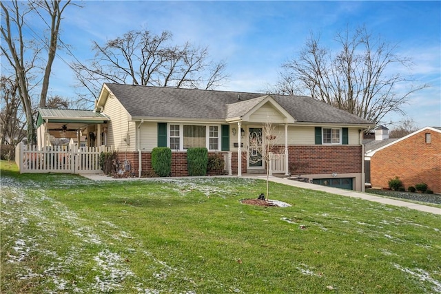 single story home with a front lawn and a garage