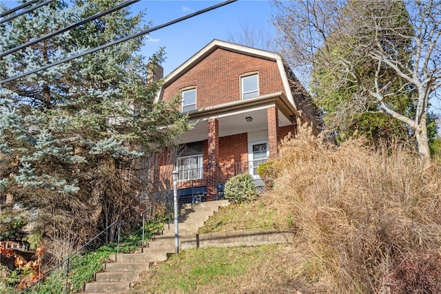 view of front property featuring a porch