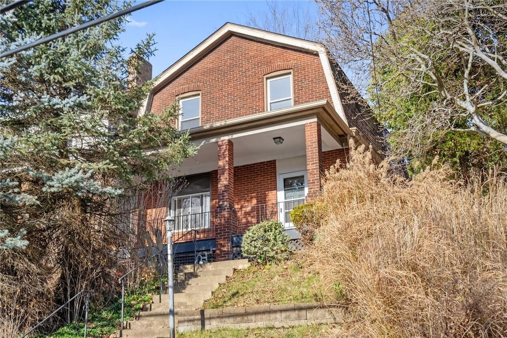 view of front property with covered porch